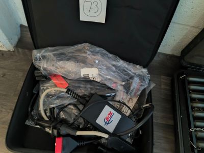 a suitcase with a bunch of electrical equipment in it