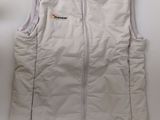 the back of a white vest with a logo on it