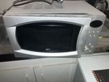 a microwave that is sitting on top of a counter