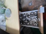 a drawer full of spoons and silverware in a kitchen