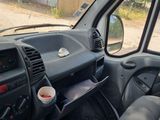 a view of the inside of a vehicle from the driver ' s seat