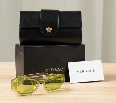 versa versa versa versa sunglasses in yellow with black case