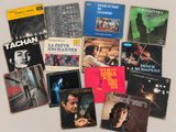 a lot of music books that are on the table