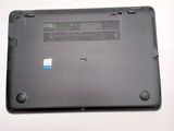 a black laptop with a blue sticker on the back of it