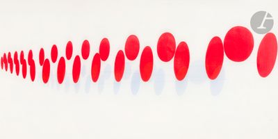 red dots are arranged in a row on a white wall
