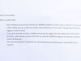 a letter written in french on a piece of paper