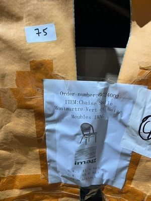 a bag of food that has been wrapped in brown paper