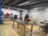 an image of a workbench in a warehouse