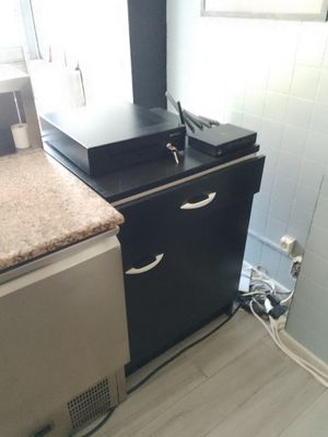 an image of a kitchen with a sink and a stove