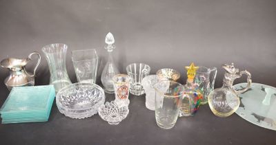 a lot of glass items sitting on a table