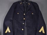 an image of a uniform jacket and a hat on a table
