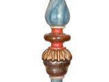 a blue and red vase sitting on top of a table
