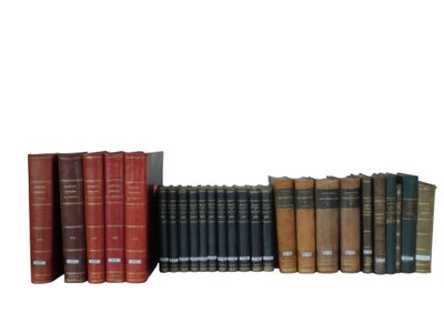 many books that are lined up together on a shelf