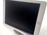 a tablet computer sitting on top of a table