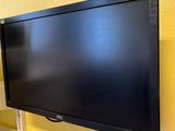 a flat screen tv mounted on the wall in the room