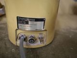 a water heater that is sitting on the floor