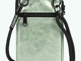 an image of a silver phone case with a black strap