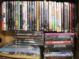 a lot of dvds in a box on the shelf
