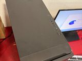a computer sitting on a desk with a keyboard and monitor