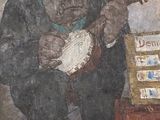tableau représentant un homme jouant du banjo, assis devant une boîte
