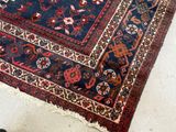 a rug on the floor with a cat on it