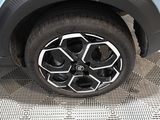 a close up of a tire on a car ' s rim