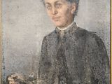 portrait d'un homme en manteau noir tenant un chat