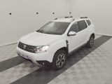 the white dacia is parked in a white room with a checkered floor