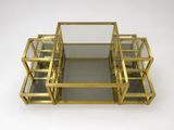 gold metal and glass coffee table with four glass shelves