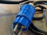 a blue power cord that is connected to a black cord