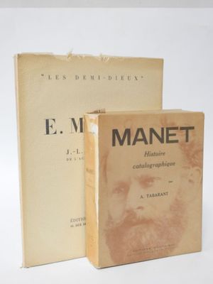 two books sitting on top of each other in front of a white background