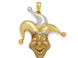 a close up of a yellow and white gold jester head pendant