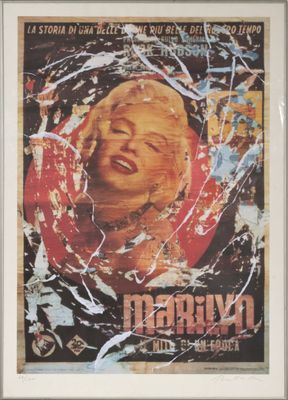 une photo d'une affiche représentant Marilyn Monroe dans un cadre blanc