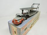 a toy truck that is sitting on top of a box