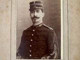 portrait of a man in a military uniform poses for a picture