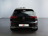 the rear of a black volkswagen vw golf