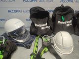 a group of safety gear and a hard hat on a table