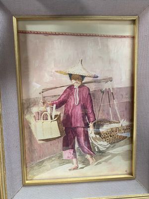 tableau représentant une femme portant un panier de fruits, dans un cadre doré