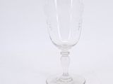 a glass that is sitting on a table