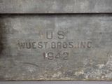 a close up of a metal box with a sign on it