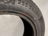 a close up of a tire on a white surface with a white background