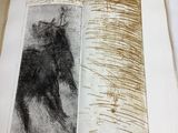 a drawing of a man riding a horse in a book