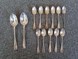 a lot of spoons and spoon spoons on the table