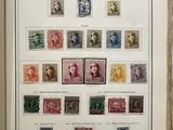 an open book with a bunch of stamps on it