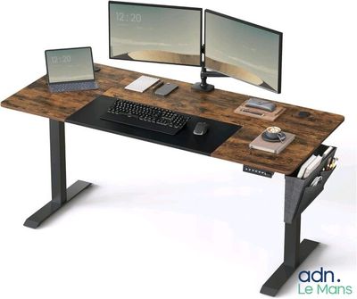 a computer desk with two monitors and a keyboard on it
