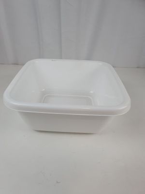 a white plastic container with a lid on a table