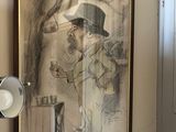 un dessin sur le mur d'une salle de bains, avec une lampe