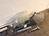 a picture of a broken refrigerator in the corner of a room