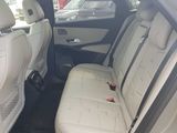 the back seats of a car are empty in the parking lot