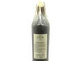 a bottle of wine that is sitting on a table